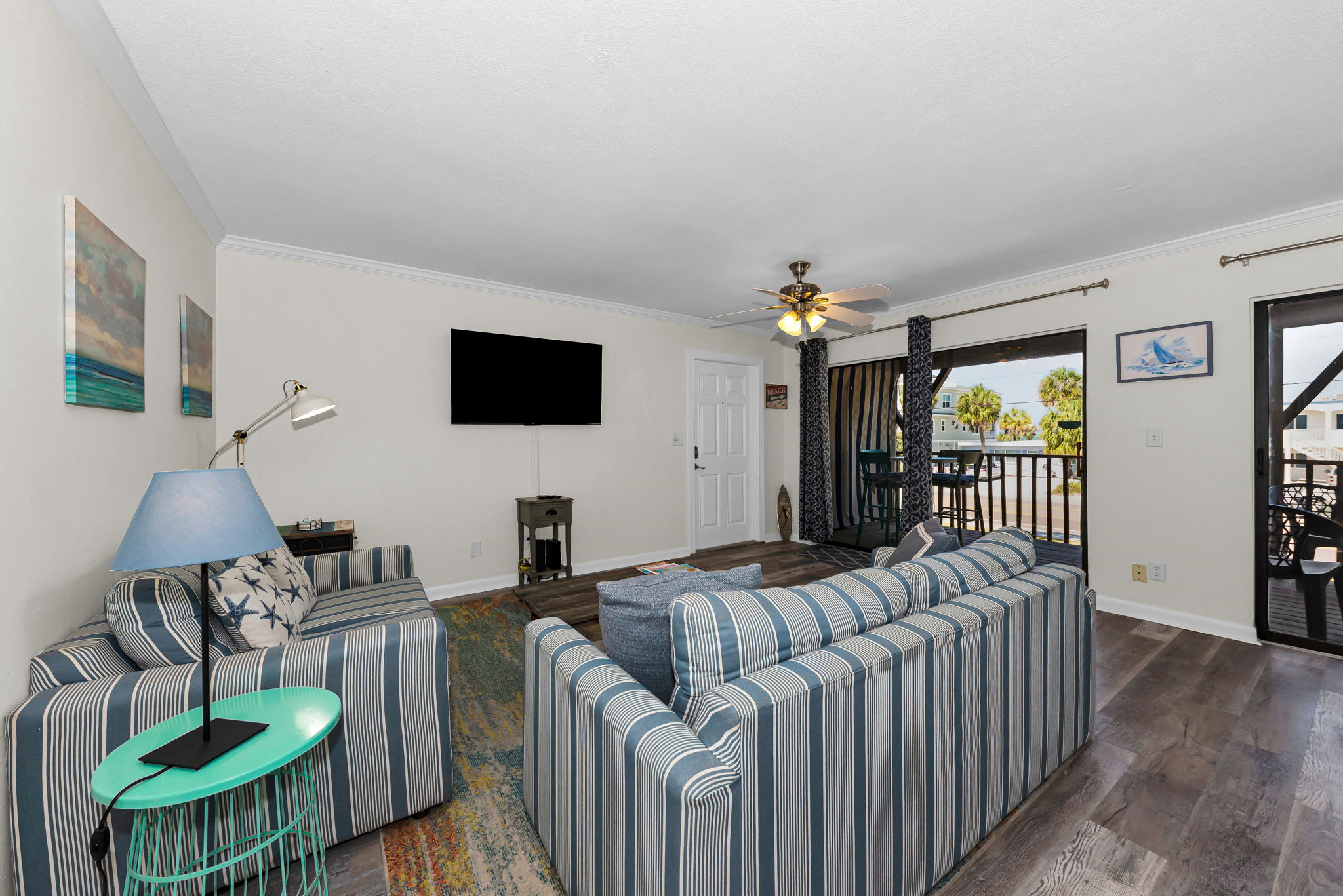 Bright living room inside Indian Rocks Beach condo
